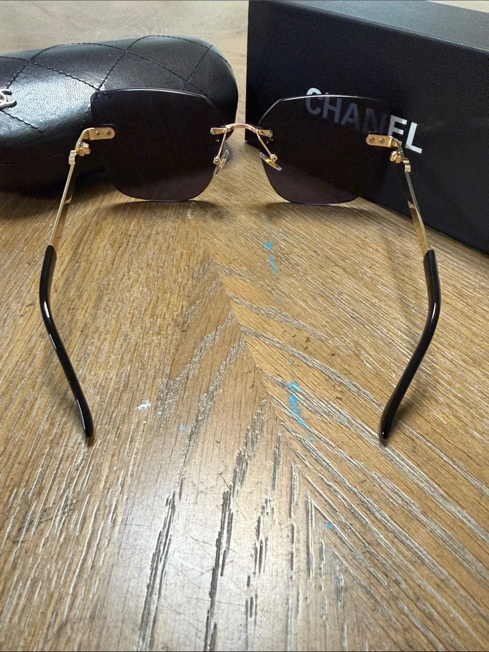 CHANEL Black Gradient Rimless Square Sunglasses with Gold Hardware